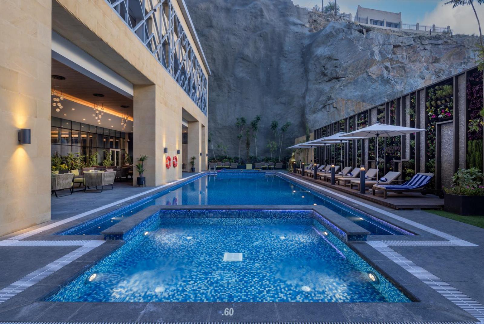 Citadines Abha Lejlighedshotel Eksteriør billede Pool at the hotel