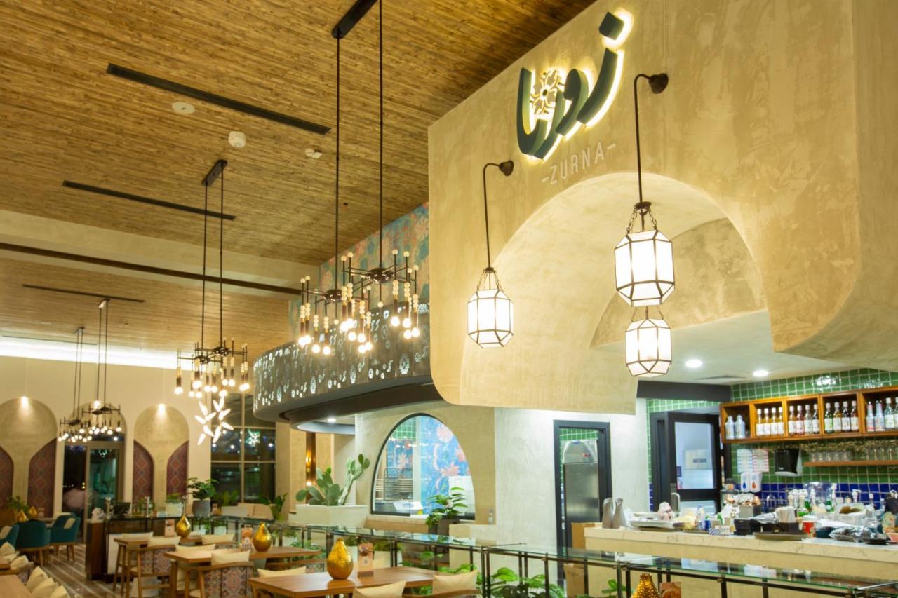 Citadines Abha Lejlighedshotel Eksteriør billede Interior of the restaurant