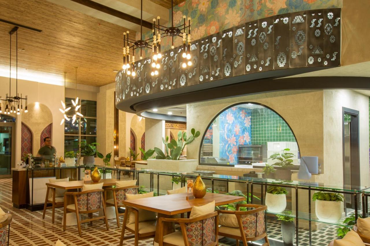 Citadines Abha Lejlighedshotel Eksteriør billede The interior of the restaurant